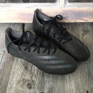 Matte black Adidas soccer cleats